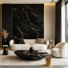 Luxury modern living room featuring a black marble accent wall with white and gold veining, cream curved sofa, black marble coffee table, warm ambient lighting, and elegant contemporary interior design.
