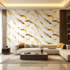Luxury white marble wall sticker with flowing metallic gold veining displayed as a premium decorative surface for modern interiors and feature walls.