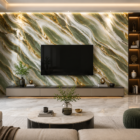 Modern luxury interior featuring a green and white UV marble sheet accent wall with flowing gold veining, elegant lighting, and contemporary living room décor.
